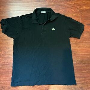 Black Lacoste polo fits like M